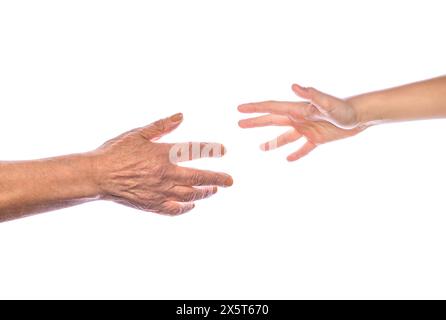 Enkelsohnes helfende Hand reicht zur Großmutter. Alter, Familie, Betreuungs- und Betreuungskonzept, Seniorin und junge Frau in Händen. Ein altes Stockfoto