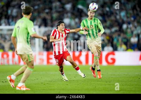 Juan Miranda von Real Betis und Luka Romero von Almeria während des spanischen Meisterschaftsspiels La Liga zwischen Real Betis und Almeria am 12. Mai 2024 im Benito Villamarin Stadion in Sevilla Stockfoto