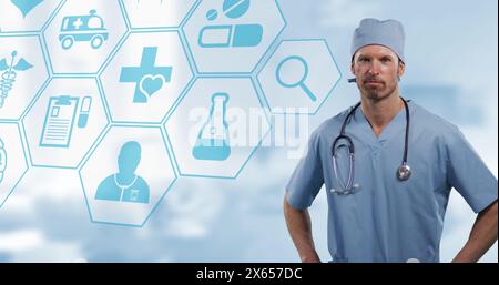 Bild eines kaukasischen männlichen Arztes über medizinischen Ikonen Stockfoto