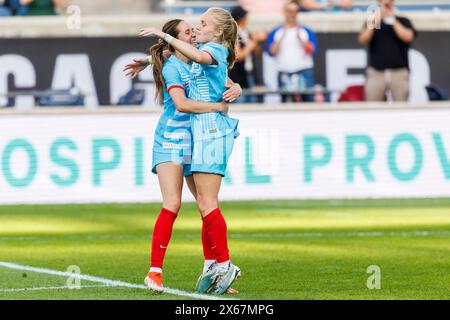 Bridgeview, Illinois, USA. Mai 2024. Die Spieler der Chicago Red Stars feiern im SeatGeek Stadium in Bridgeview, Illinois, ihr Tor während der NWSL Soccer-Action zwischen dem Utah Royals FC und den Chicago Red Stars. John Mersits/CSM/Alamy Live News Stockfoto