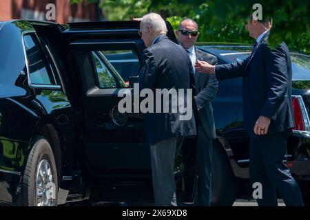 Washington, DC, USA. Mai 2024. US-Präsident Joe Biden betritt seine Limousine, nachdem er am 13. Mai 2024 die Marine One in Fort Lesley J. McNair in Washington, DC, USA verlassen hatte. Präsident Biden kehrt von Rehoboth Beach, Delaware, nach Washington zurück. Quelle: Shawn Thew/Pool über CNP/dpa/Alamy Live News Stockfoto
