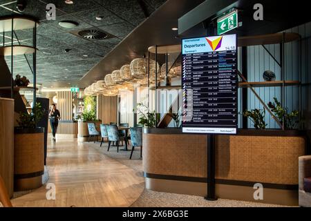 Informationsbildschirm in der Business Lounge am Flughafen Perth, Western Australia Stockfoto