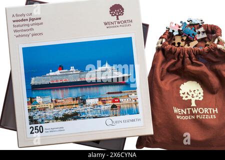 Wentworth Puzzle Box und Tasche aus Holz mit Puzzleteilen - eine fein geschnittene Holzpuzzle-Säge mit einzigartigen Wentworth Wimsy Stücken Stockfoto