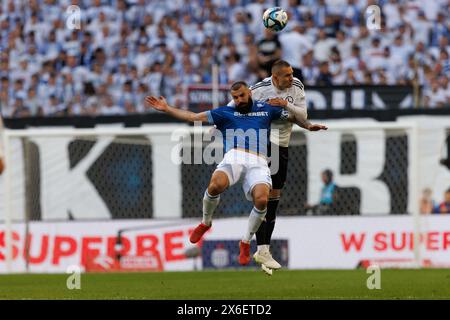 Michael Ishak, Artur Jędrzejczyk während des PKO BP Ekstraklasa Spiels zwischen Lech Poznan und Legia Warszawa im Enea Stadium, Posen, Polen (Maciej Rogo) Stockfoto