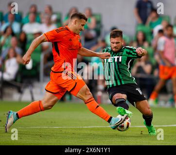 Austin, Texas, USA. Mai 2024. Austin FC-Stürmer Diego Rubio (14) spielt am 15. Mai 2024 in Austin gegen den Houston Dynamo-Verteidiger Franco Escobar (2). (Kreditbild: © Scott Coleman/ZUMA Press Wire) NUR REDAKTIONELLE VERWENDUNG! Nicht für kommerzielle ZWECKE! Stockfoto