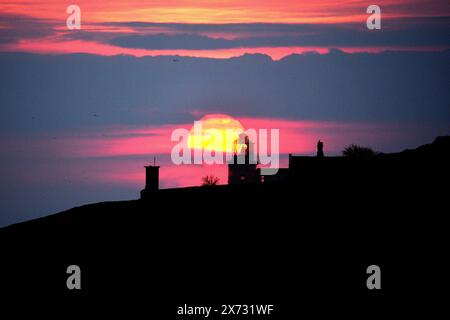 Sonnenuntergang am Anvil Point Lighthouse. Swanage. Dorset Stockfoto