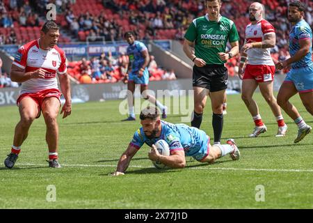 Abbas Miski von Wigan Warriors geht zum Versuch während des Betfred Challenge Cup Halbfinales Hull KR gegen Wigan Warriors im Eco-Power Stadium, Doncaster, Großbritannien, 18. Mai 2024 (Foto: Mark Cosgrove/News Images) Stockfoto