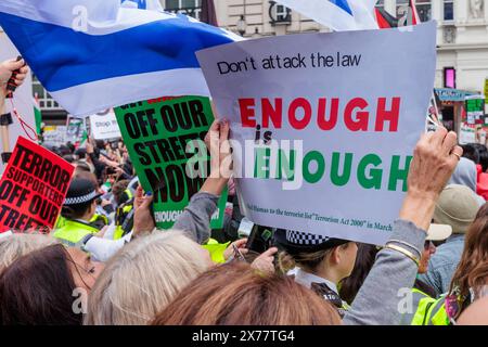 Piccadilly Circus, London, Großbritannien. Mai 2024. Britische Bürger aller Glaubensrichtungen stehen gegen Terrorismus und Extremismus beim Gegenprotest "genug ist genug" zusammen. Die Gegenproteste wurden als Reaktion auf fast acht Monate propalästinensische Märsche organisiert, bei denen der Hass eskaliert und die offene Unterstützung terroristischer Organisationen offen unterstützt wurde. Frühere Gegenproteste haben dazu geführt, dass die Gruppe mit Todesdrohungen und Aufforderungen zum Völkermord an Juden aus der Nation Israel konfrontiert ist. Quelle: Amanda Rose/Alamy Live News Stockfoto