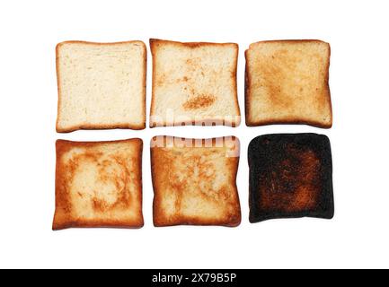 Röstgarung. Brotscheiben in verschiedenen Farbtönen isoliert auf weiß, Blick von oben Stockfoto