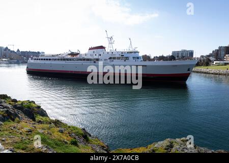Die MV Coho Fähre fährt vom Inner Harbour in Victoria, British Columbia, Kanada in Richtung Port Angeles, Washington, USA. Stockfoto