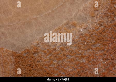 Honigonyx-Textur, Hintergrund in natürlicher Farbe für stilvolles Design. Stockfoto