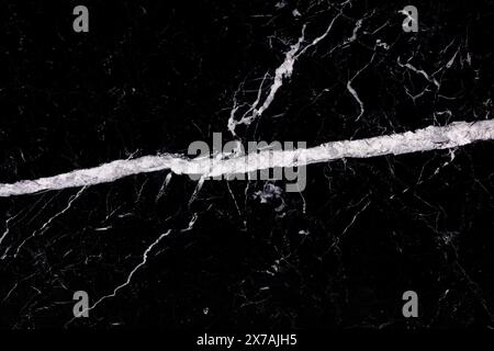 Natürlicher Nero Marquina Marmor in strenger schwarzer Farbe. Stockfoto