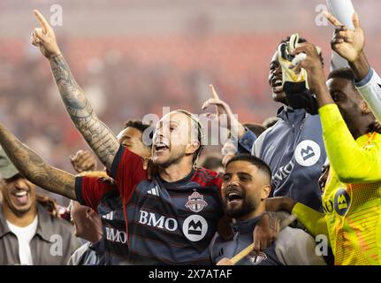 Toronto, Kanada. Mai 2024. Die Spieler des Toronto FC feiern den Sieg nach dem Spiel der Major League Soccer (MLS) 2024 zwischen Toronto FC und CF Montreal im BMO Field in Toronto, Kanada, am 18. Mai 2024. Quelle: Zou Zheng/Xinhua/Alamy Live News Stockfoto