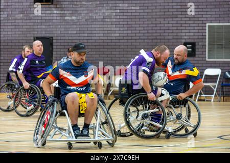 Brentwood Essex 19. Mai 2024 Rollstuhl Rugby League: Brentwood Aels (Stripped Shirt, gelbe Tags) vs Team Colostomy UK (Purple Shirts, weiße Tags) im Brentwood Centre, Brentwood Essex UK Credit: Ian Davidson/Alamy Live News Stockfoto