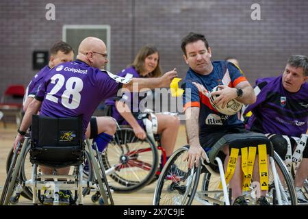 Brentwood Essex 19. Mai 2024 Rollstuhl Rugby League: Brentwood Aels (Stripped Shirt, gelbe Tags) vs Team Colostomy UK (Purple Shirts, weiße Tags) im Brentwood Centre, Brentwood Essex UK Credit: Ian Davidson/Alamy Live News Stockfoto