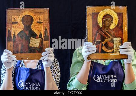 Olympia Auktionen London 20 Mai 2024 (R) Eine russische Ikone der Mutter Gottes, 19. Jahrhundert Est 120-180 £ (L) Eine russische Ikone des Heiligen Nikolaus des Wunderarbeiters Ende des 19. Jahrhunderts Est 200-300 £ Auktionsdatum 23-Mai 2024,25 Blythe Road. Quelle: Paul Quezada-Neiman/Alamy Live News Stockfoto