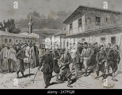 Die Östliche Frage. Serbisch-Türkische Kriege (1876-1878). Serbien erklärte dem Osmanischen Reich am 30. Juni 1876 den Krieg. Der Aprilaufstand 1876 wurde von den türkischen Behörden in Bulgarien mit starker Repression erlebt. Serbische Aufständische wurden von den Türken ins Gefängnis gebracht. Stich von Charles Baude. "La Guerra de Oriente" (russisch-türkischer Krieg). Band II. 1877. Autor: Charles Baude (1853-1935). Französischer Graveur. Stockfoto