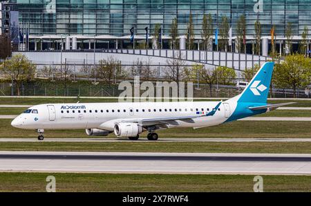 München, 6. April 2024: Ein Embraer 195LR von Air Dolomiti Taxis zur Start- und Landebahn am Flughafen München. Registrierung I-ADJK. (Foto: Andreas Haas/d Stockfoto