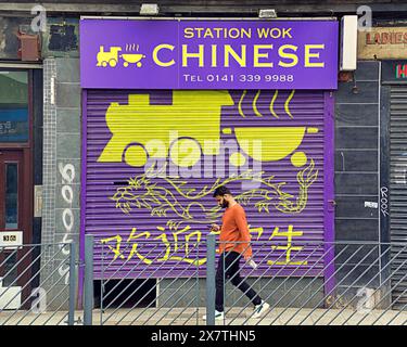 Glasgow, Schottland, Großbritannien. 21. Mai 2024: Station chinese Wok in partick UK Wetter: Heißes Wetter sah eine Ankunft des Sommers, als Einheimische und Touristen in der Stadt zur Mittagszeit ins Stadtzentrum fuhren. Credit Gerard Ferry/Alamy Live News Stockfoto