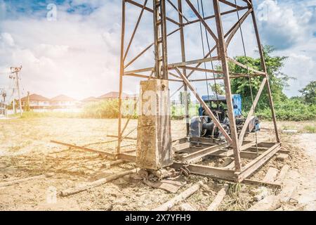 Pfahlfahrer auf der Baustelle des Hauses Stockfoto