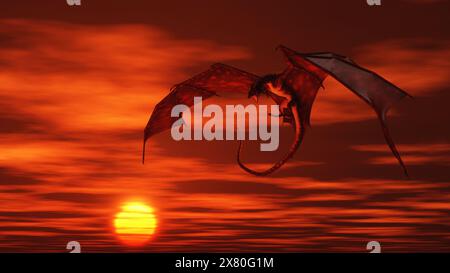 Roter Drache greift von einem leuchtend orangefarbenen Sonnenuntergangshimmel an Stockfoto