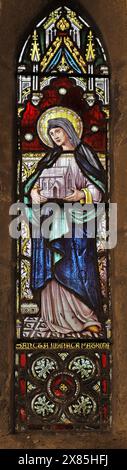 Buntglasfenster von Edwin Horwood mit St. Manacca, St. Manaccus & St. Dunstan, Manaccan, Cornwall Stockfoto