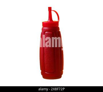 Nahaufnahme von Ketchup-Flaschen auf weißem Hintergrund. Heiße scharfe Soße Spritzen, Tomaten-Ketchup blobs auf weißem Hintergrund. Stockfoto