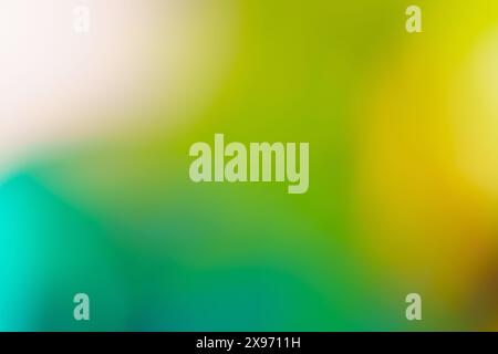 Weicher abstrakter goldgelber und grüner Hintergrund in hellen, glücklichen, beruhigenden natürlichen Farben Stockfoto