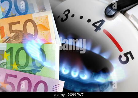 Heizung und Gasflamme als Symbolbild für Energie- und Nebenkosten mit Euro Geldscheinen - FOTOMONTAGE *** Heating and GA Stockfoto