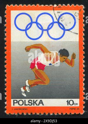 POLEN - CA. 1969: Briefmarke gedruckt von Polen, zeigt Runner, ca. 1969 Stockfoto