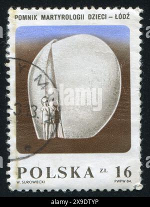 POLEN - CA. 1984: Briefmarke gedruckt von Polen, zeigt das gebrochene Herz-Denkmal, Lodz, ca. 1984 Stockfoto