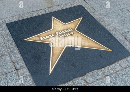 Lodz, Polen - 14. April 2024: Star des Regisseurs Roman Polanski auf dem Lodz Walk of Fame. Stockfoto