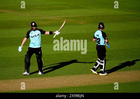 Surreys Jamie Smith (links) feiert sein halbes Jahrhundert während des Spiels Vitality Blast T20 im Kia Oval in London. Bilddatum: Sonntag, 2. Juni 2024. Stockfoto