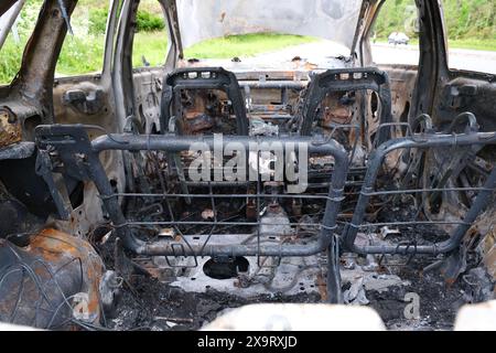 Ausgebranntes Auto in einem Lay-by auf der A66 in cumbria bei penrith Stockfoto