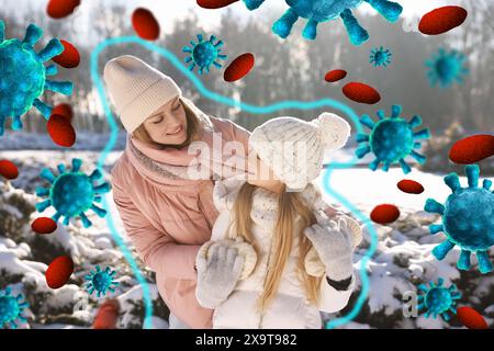 Glückliche Mutter mit ihrer Tochter, die im Winter draußen läuft. Umrisse um sie herum symbolisieren starke Immunität, die Viren blockiert, Illustration Stockfoto