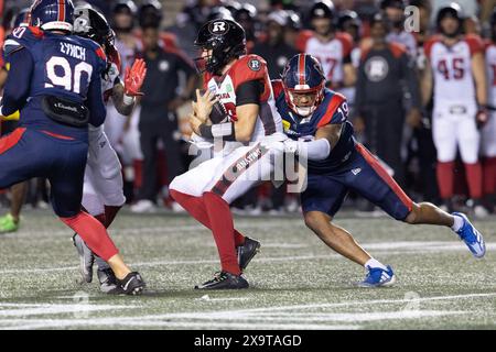 Ottawa, Kanada. 31. Mai 2024. Ottawa Redblacks Quarterback Dustin Crum (18) spielt mit dem Ball während des CFL-Vorsaisonspiels zwischen Montreal Alouettes und Ottawa Redblacks im TD Place Stadium in Ottawa, Kanada. Daniel Lea/CSM (Credit Image: © Daniel Lea/Cal Sport Media). Quelle: csm/Alamy Live News Stockfoto