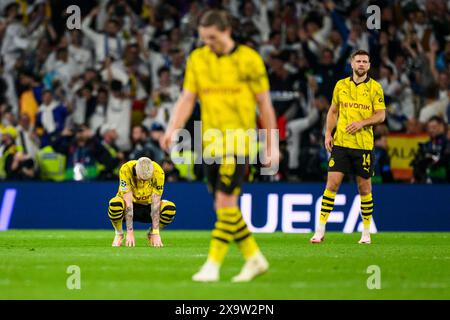 London, Großbritannien. Juni 2024. Fußball: Champions League, Borussia Dortmund - Real Madrid, K.-o.-Runde, Finale, Wembley-Stadion. Dortmunder Marco Reus (l-r), Dortmunder Marcel Sabitzer und Dortmunder Niclas Füllkrug reagieren unglücklich nach dem Spiel. Quelle: Tom Weller/dpa/Alamy Live News Stockfoto