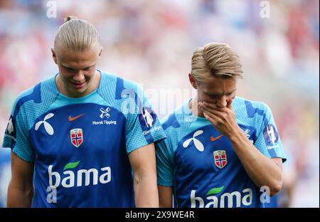 Dateifoto vom 06/23 des Premier League-Paares Erling Haaland (links) und Martin Odegaard, das nicht an den Euro teilnehmen wird, nachdem Norwegen sich nicht qualifiziert hat. Auch die skandinavischen Nachbarn Schweden konnten sich nicht qualifizieren, so dass Alexander Isak und Dejan Kulusevski nicht anwesend sein werden. Ausgabedatum: Montag, 1. Juni 2024. Stockfoto