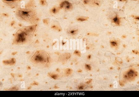 Dünner Hintergrund mit Pita-Brot-Textur. Armenisches Fladenbrot ungesäuertes Fladenbrot. Draufsicht. Frisch gebackenes, hausgemachtes orientalisches Brot. Lavash als strukturiertes B Stockfoto