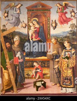 SPELLO, ITALIEN - 18. MAI 2024: Gemälde der Madonna mit den Heiligen in der Kirche Chiesa di San Andrea von Pinturicchio (1454 - 1513) Stockfoto