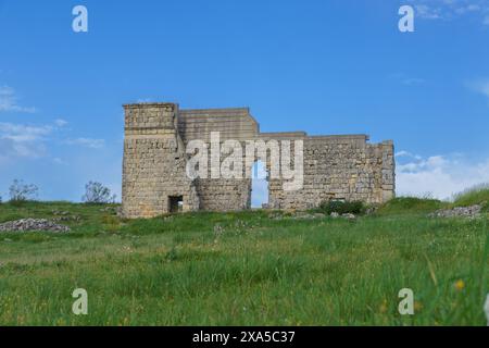 Das römische Theater in der antiken Stadt Acinipo in der Serrania de Ronda, Provinz Malaga, Andalusien, Spanien Stockfoto