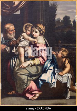 PERUGIA, ITALIEN - 15. MAI 2024: Gemälde der Heiligen Familie in der Kirche Chiesa di Santa Maria di Monteluce - Kopie von Giulio Romano aus dem 19. MAI. Cent. Stockfoto