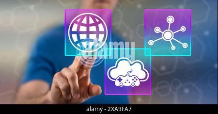 Mann berührt ein Cloud-Gaming-Konzept auf einem Touchscreen Mit dem Finger Stockfoto