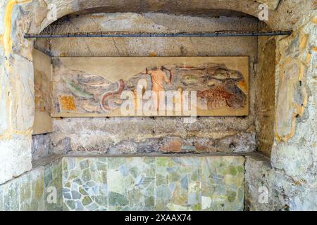 Gemälde in den Thermen der Sieben Weisen (Terme dei Sette Sapienti). Das Gebäude stammt wahrscheinlich aus der Hadrianischen Zeit (117–138 n. Chr.) - Archäologischer Park von Ostia Antica, Rom, Italien Stockfoto