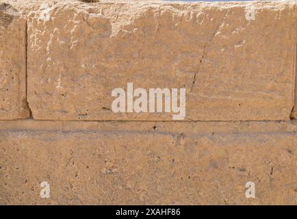 Textur einer alten Steinmauer Stockfoto