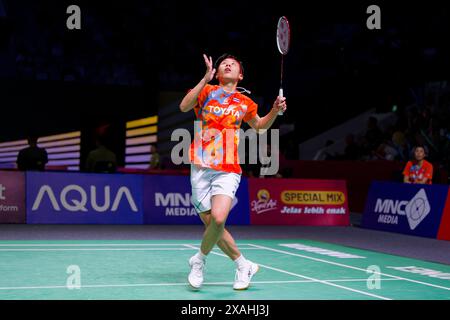 Supanida Katethong von Thailand im Einzelspiel am dritten Tag der Kapal API Indonesia Open gegen Gregoria Mariska Tunjung von Ind Stockfoto