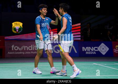 Apriyani Rahayu (R) und Siti Fadia Silva Ramadhanti aus Indonesien im Doppel-Spiel der Frauen am dritten Tag der Kapal API Indonesia Ope Stockfoto