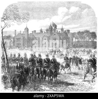 Ankunft des Prinzen und der Prinzessin von Wales in Melford Hall, Suffolk, dem Sitz von Lord Alfred Paget, 1865. Dieses Herrenhaus ist ein schönes Beispiel für den elisabethanischen Stil der Architektur, mit einem Viereck und zwei achteckigen Türmen, die mit Türmen überragt werden, und vier Türmen ähnlichen Designs an der Westfront des Hauptgebäudes. Es blickt auf den weitläufigen Park... und das Gelände auf dem Anwesen ist tolerierbar gut mit Wildtieren bestückt... der Prinz und die Prinzessin [der zukünftige König Edward VII und Königin Alexandra]... wurden von Lord Alfred Paget empfangen... und in einer Kutsche und vier, zur Melford Hall geführt; dem Roa Stockfoto