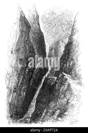 Die Devon Valley Railway in Schottland: gorge in the Burn of Care, Castle Campbell, 1869. "Viele der Spalten oder Schluchten in den Ochils, wo die Berglandungen in die Ebene unten hinabsteigen, sind einzigartig schön; so sind Alva Glen und Tillicoultry-Penner, aber das bemerkenswerteste ist Dollar Glen. Dies ist den Touristen schon lange bekannt, aber die schönsten Ausblicke auf die Felsen und Stromschnellen des Burns wurden erst in den letzten Jahren für den gewöhnlichen Reisenden geöffnet. Es ist ein fein bewaldetes, schmales Tal, oder besser gesagt Schlucht, mit steilen Wandabstürzen, die an einem Teil zu einer großen Höhe steigen, und der Dolla Stockfoto