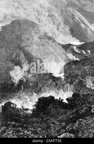 Der Ausbruch des Vesuvs [in Italien]: Lavaflut und glühende Asche, 1868. Gravur einer Skizze von Lieutenant H. Robley vom 68. Regiment, die zeigt, dass die bewegte Masse lebender Asche und Lava in der Nacht vom 5. Januar bergab reist. Es hatte eine sehr spürbare Bewegung, wie ein Meer aus Schlamm. Seine Form ähnelte der eines Gletschers, besonders an der Basis, wo sich, als er immer wieder fiel, die Kruste aus grauer Asche öffnete und im Inneren, wie in einem riesigen Ofen, das lebende Feuer der Lava zeigte. Der Tag wurde durch Regen und Dampf vom Regen und Nebel auf dem Feuer verdeckt. Th Stockfoto